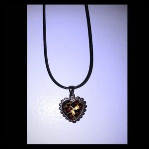Cheetah / leopard print pendant on 18in black cord